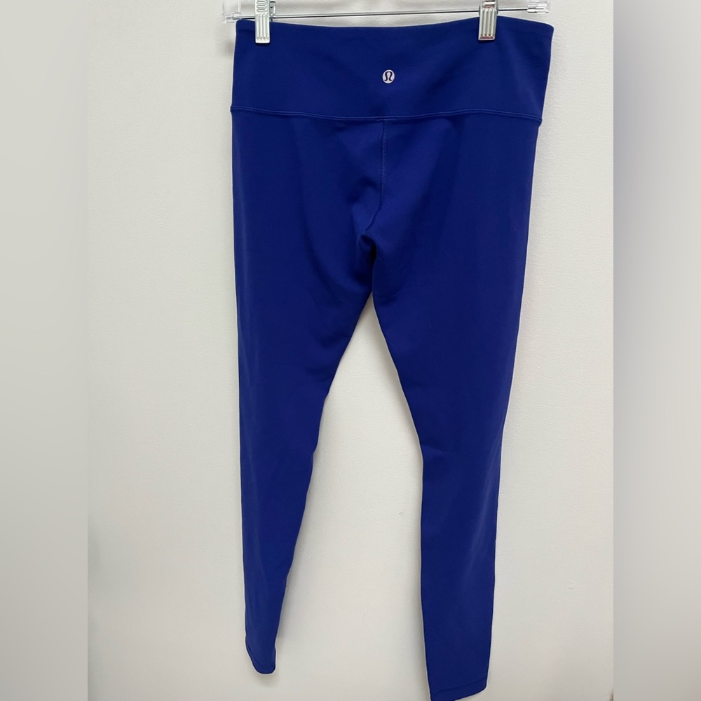 Reversible lululemon wunder pants (black/purple) size 8